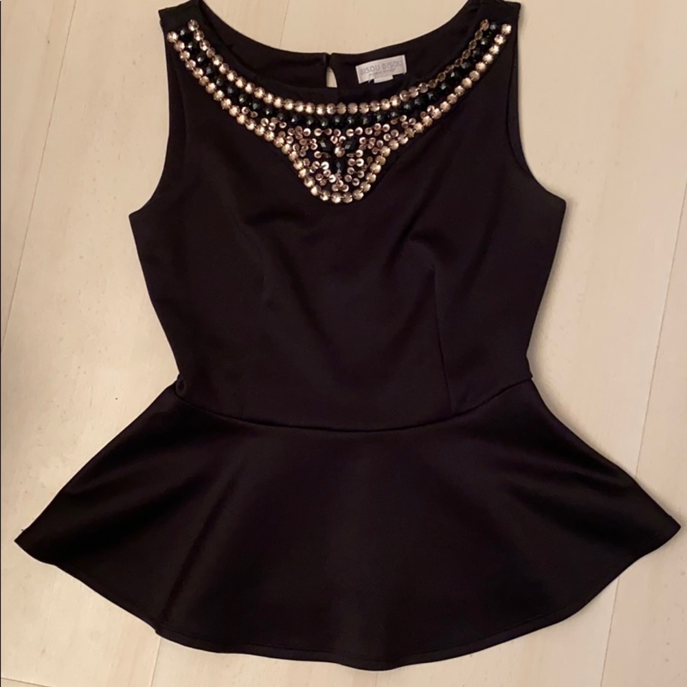 Black peplum blouse with neckline embellishments
